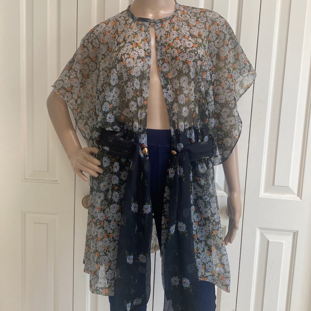 Adorable Womens Floral Sheer Cover Cardigan. Daisies. Button on neckline. Open